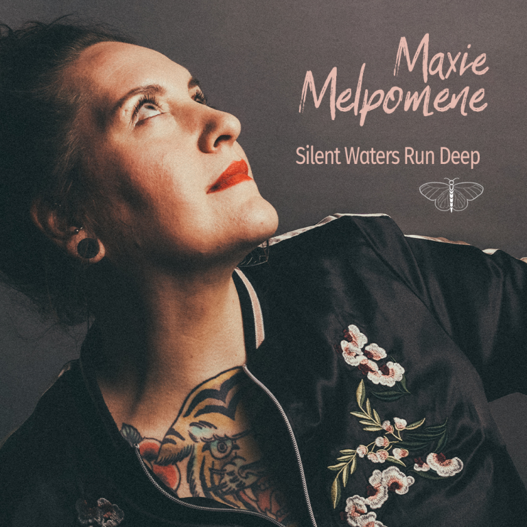 Maxie Melpomene’s Debut Single “Silent Waters Run Deep”: A Journey of Emotional Depth and Self-Discovery